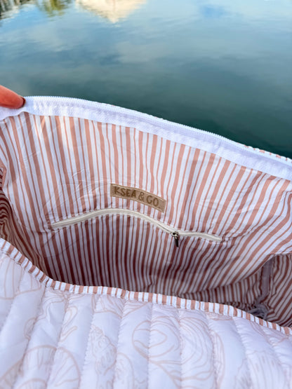 Ivory Tides Quilted Duffle Bags